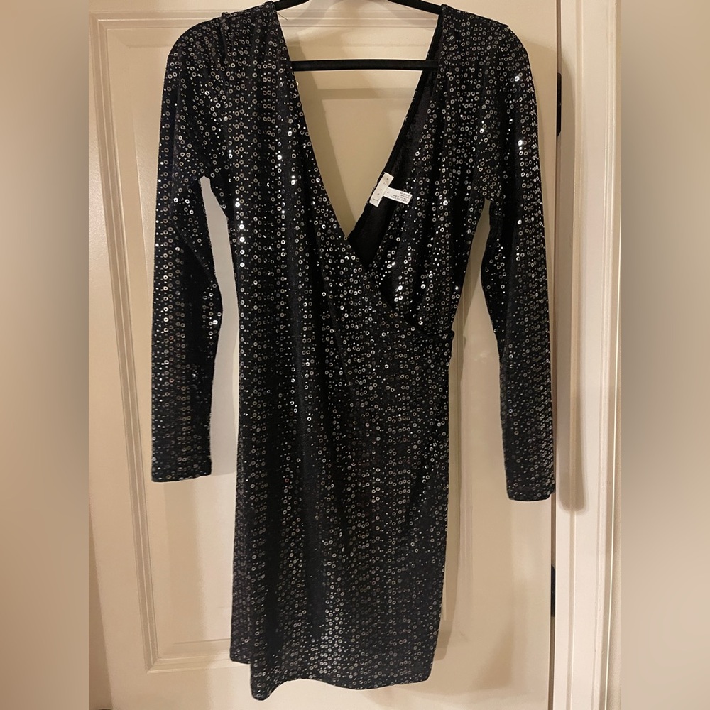Black sequins dress.